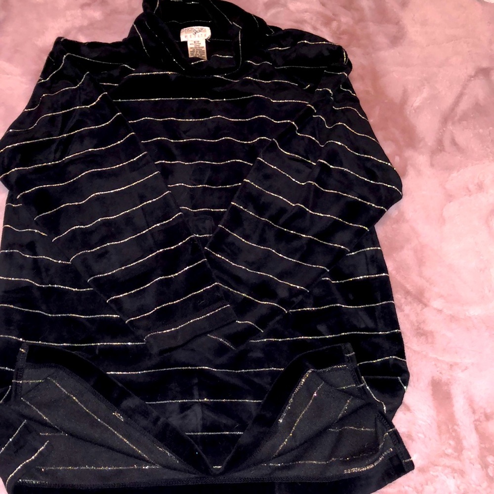 Nice 👍 ladies gently used turtle neck sweater with a gold glitter stripe!